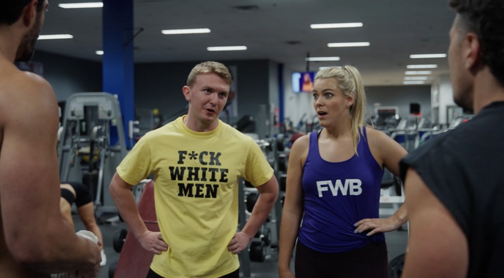 Two gym members confront the owners on the gym floor