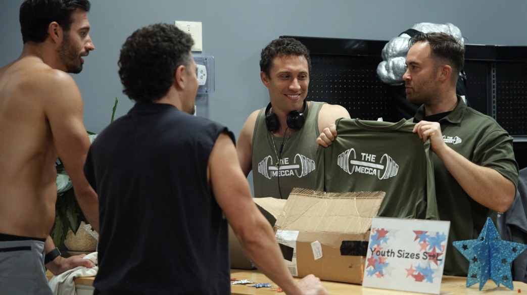 The owners unbox new Mecca t-shirts